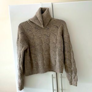 Cozy cowl neck sweater in khaki.